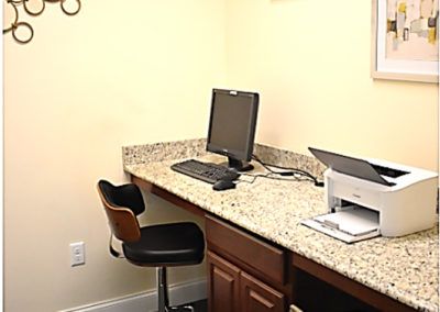 Computer and printer in the business center at The Reserve at Manada Hill in Hershey PA. Hershey apartments for rent.